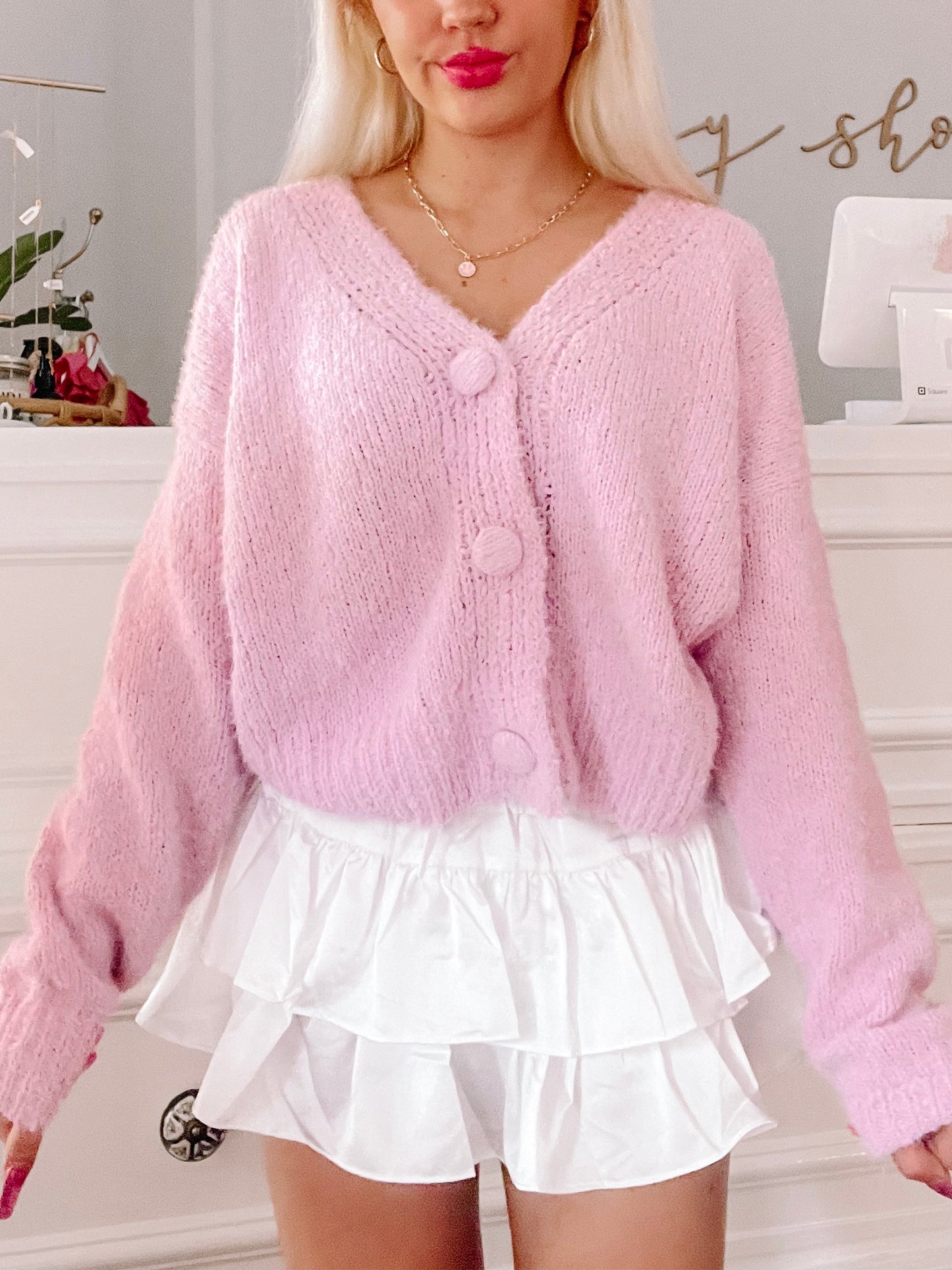 Blush Blush Baby Cardigan: Fluffy pink button-front cardigan.
