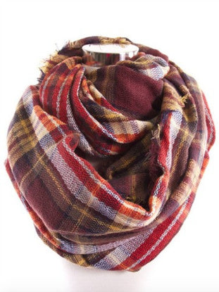 Plum-colored Bundle Me Up scarf in a cozy plaid pattern.
