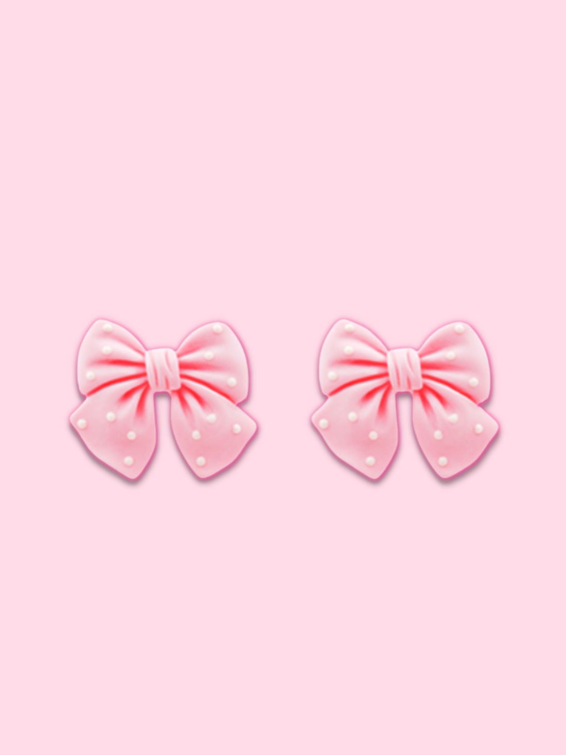 Polka Pink Bow earrings: Pink bow-shaped earrings with white polka dots.
