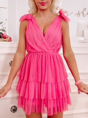 Hot pink Dotted Doll Dress, tiered ruffle mini dress with bow shoulder straps.
