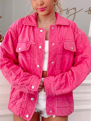 Hot pink quilted jacket, button front, casual style.
