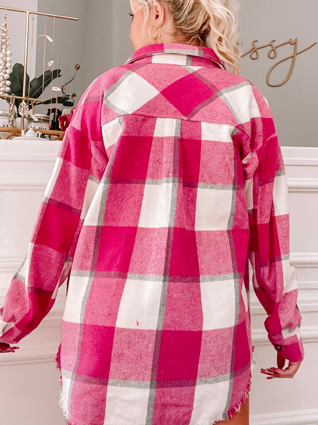 Pink and white plaid shacket with frayed hem, shown from the back from Sassy Shortcake

