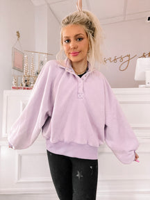 Lilac Brynn Pullover Top:  Soft, oversized lilac sweatshirt with button placket.
