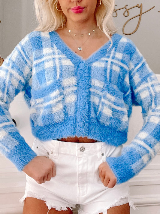 Fuzzy light blue and white plaid cardigan, button-front, cropped.
