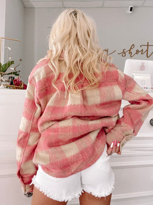 Pink and cream fluffy plaid shacket, shown from the back.
