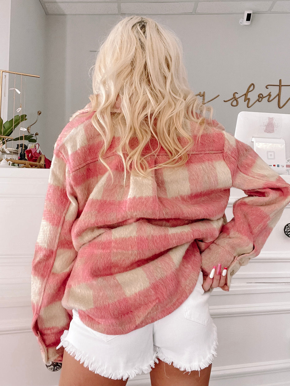 Pink and cream fluffy plaid shacket, shown from the back.
