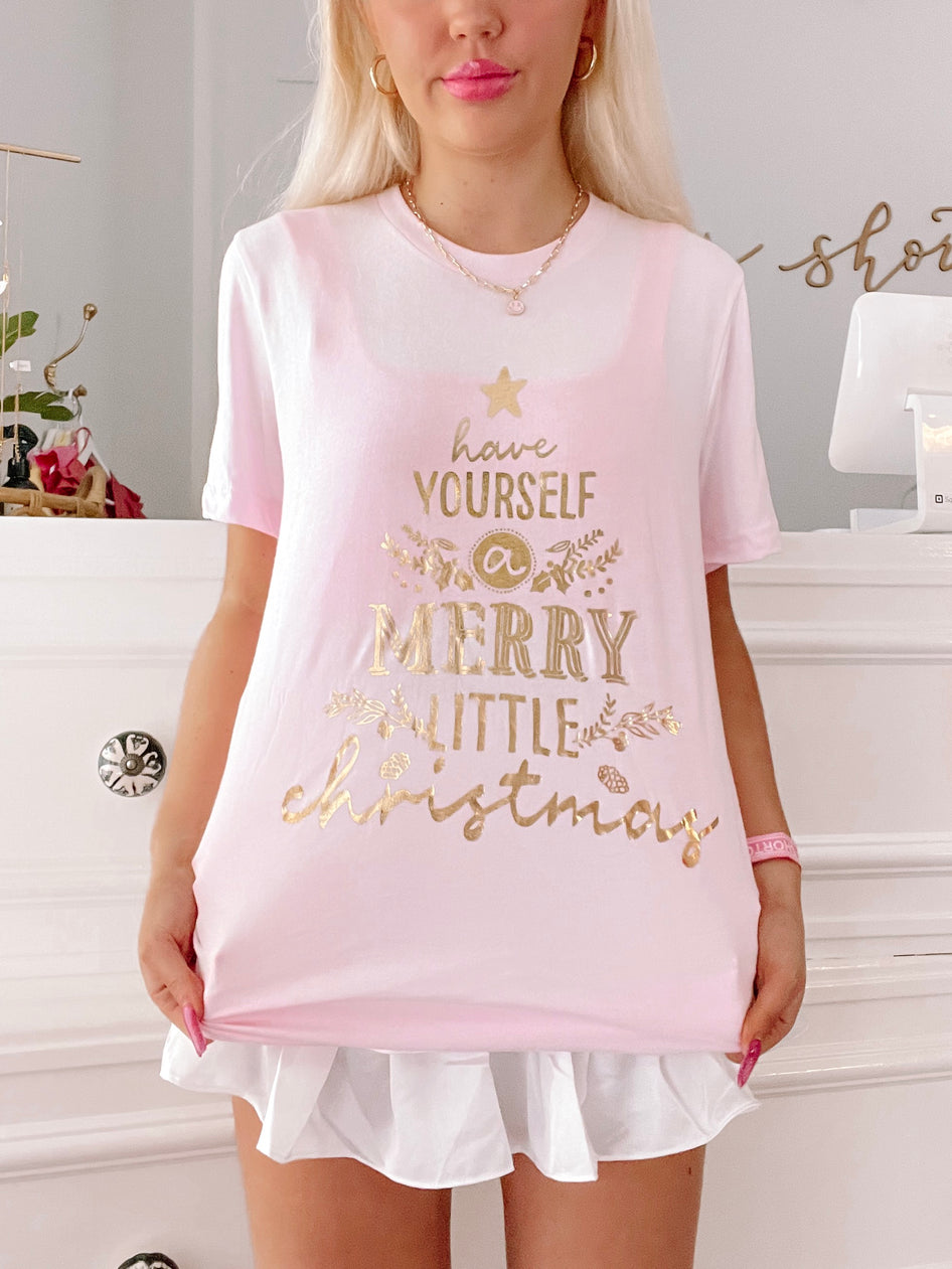 Pink Merry Little Christmas tee with gold foil lettering.
