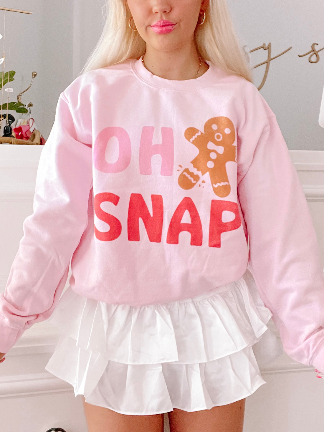 Pink Oh Snap crewneck sweatshirt with gingerbread man graphic
