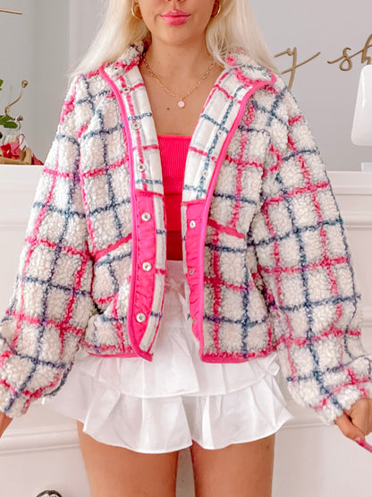 Cream, pink & blue plaid teddy jacket; fluffy texture, bright pink interior.
