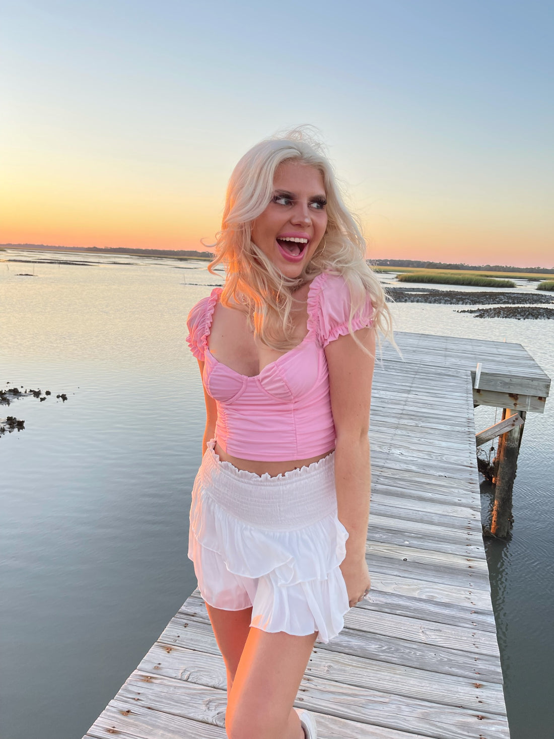 Wildest Dreams Top in pink; flirty, ruffled short-sleeve crop top.
