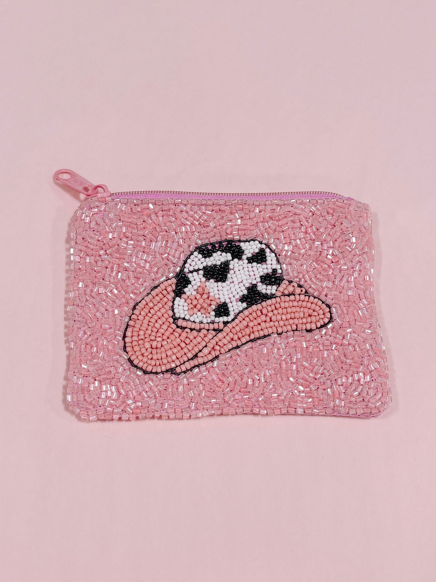 Pink beaded cowgirl hat pouch with zipper closure
