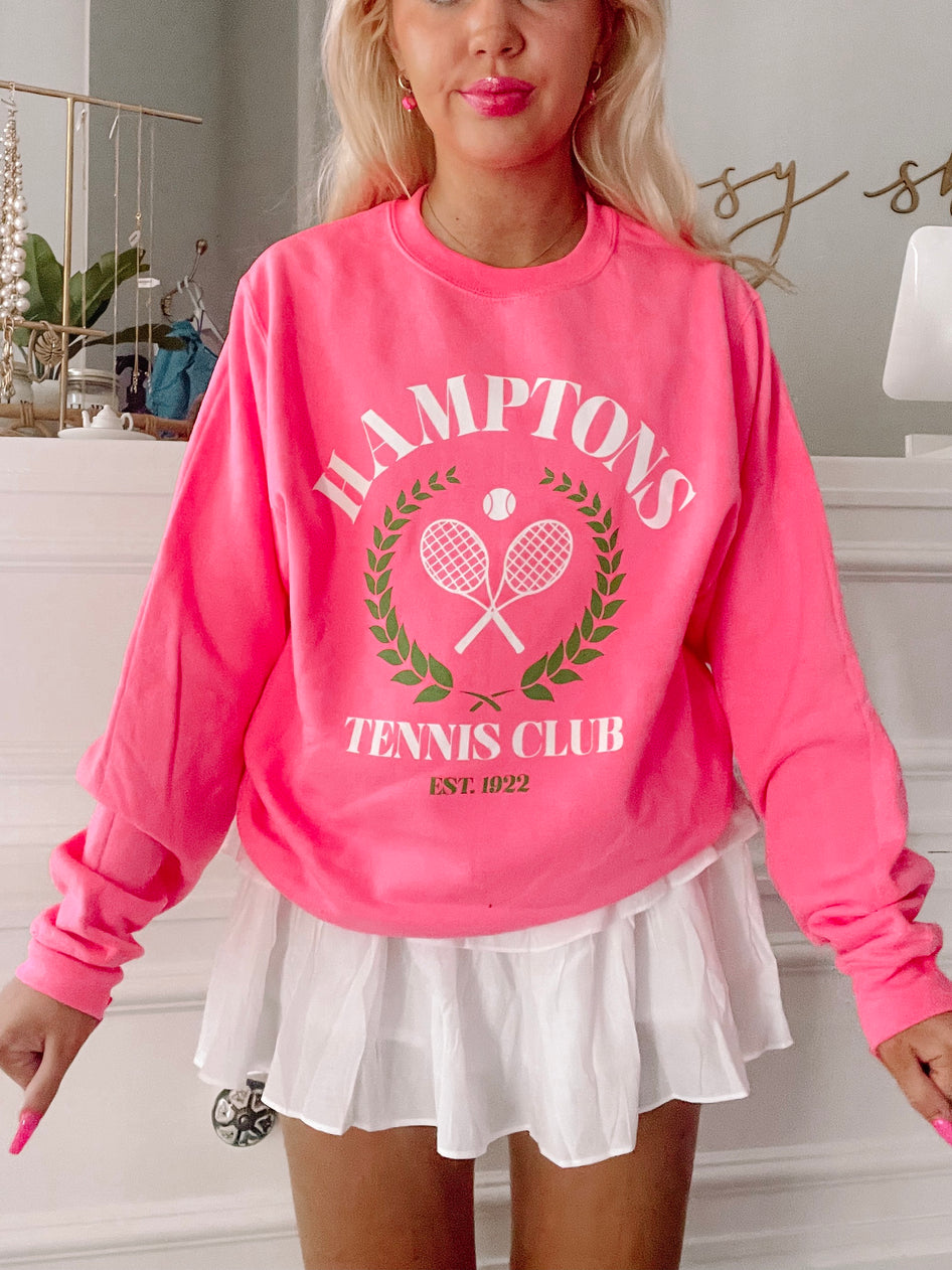 Pink Hamptons Tennis Club crewneck sweatshirt with tennis racquet graphic
