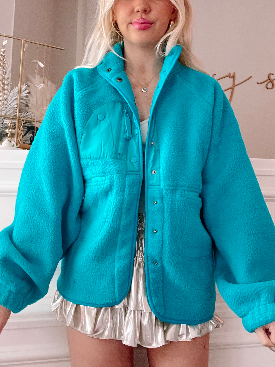 Teal Heartbreaker Jacket: Cozy fleece jacket with snap button closure.
