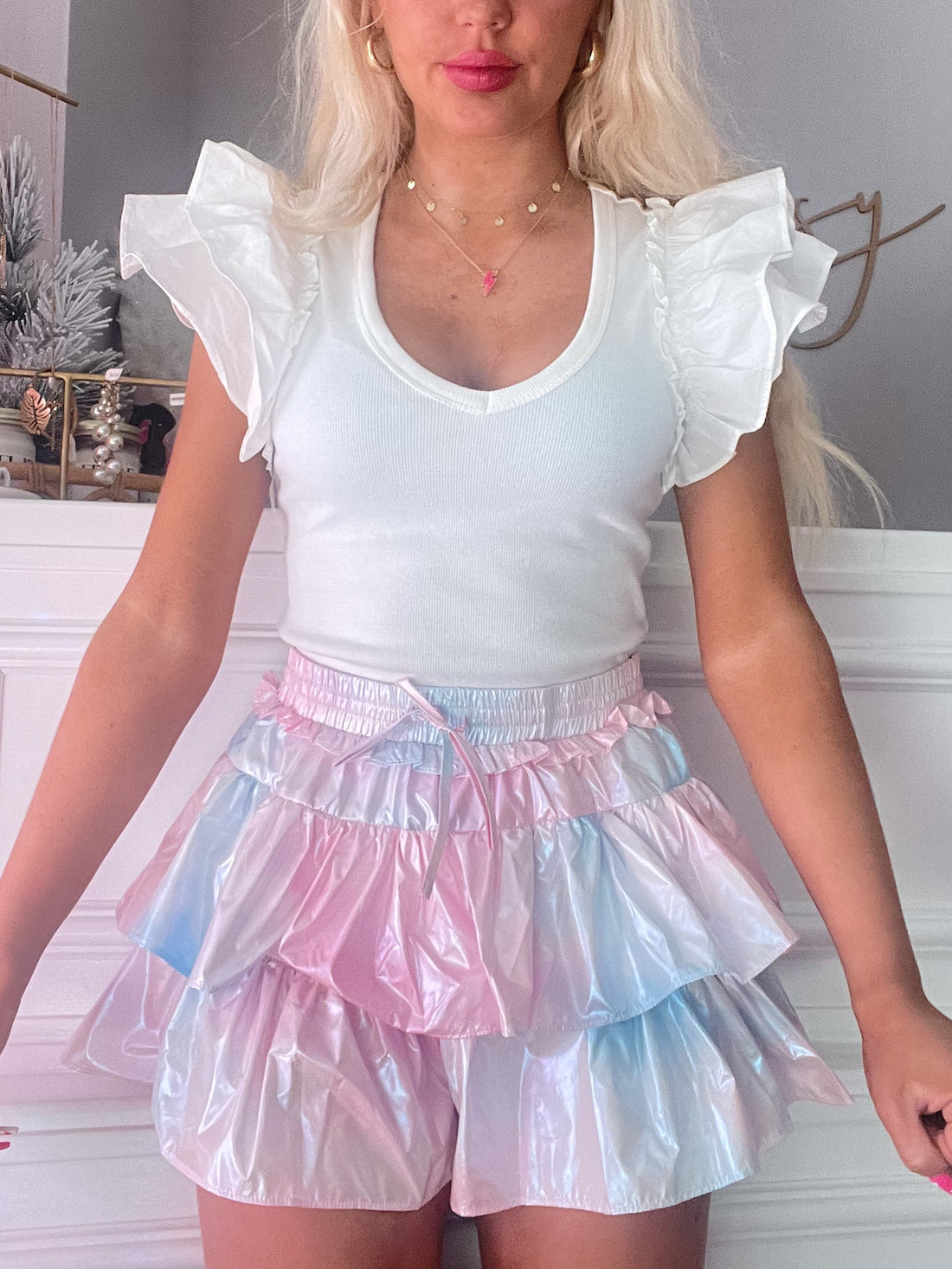 Flirtatious Candy Clouds iridescent pink, blue mini skirt; tiered ruffle detail.
