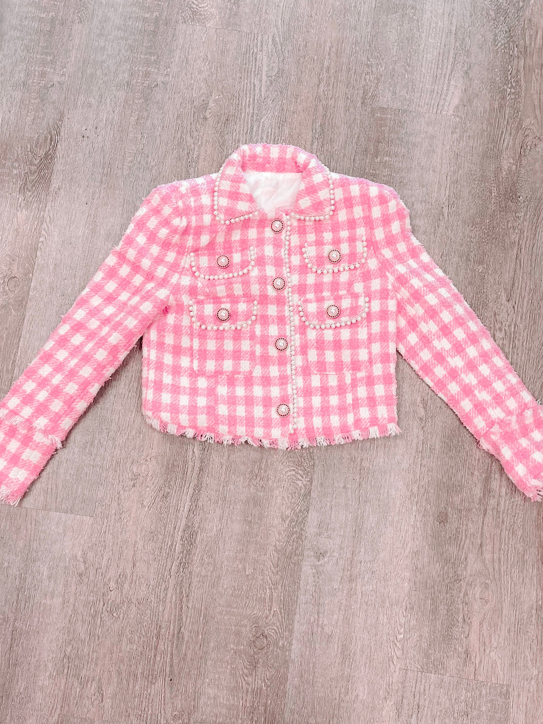 Pink tweed coat with pearl detailing
