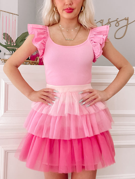 Pink tulle layered mini skirt, pastel ombre effect.