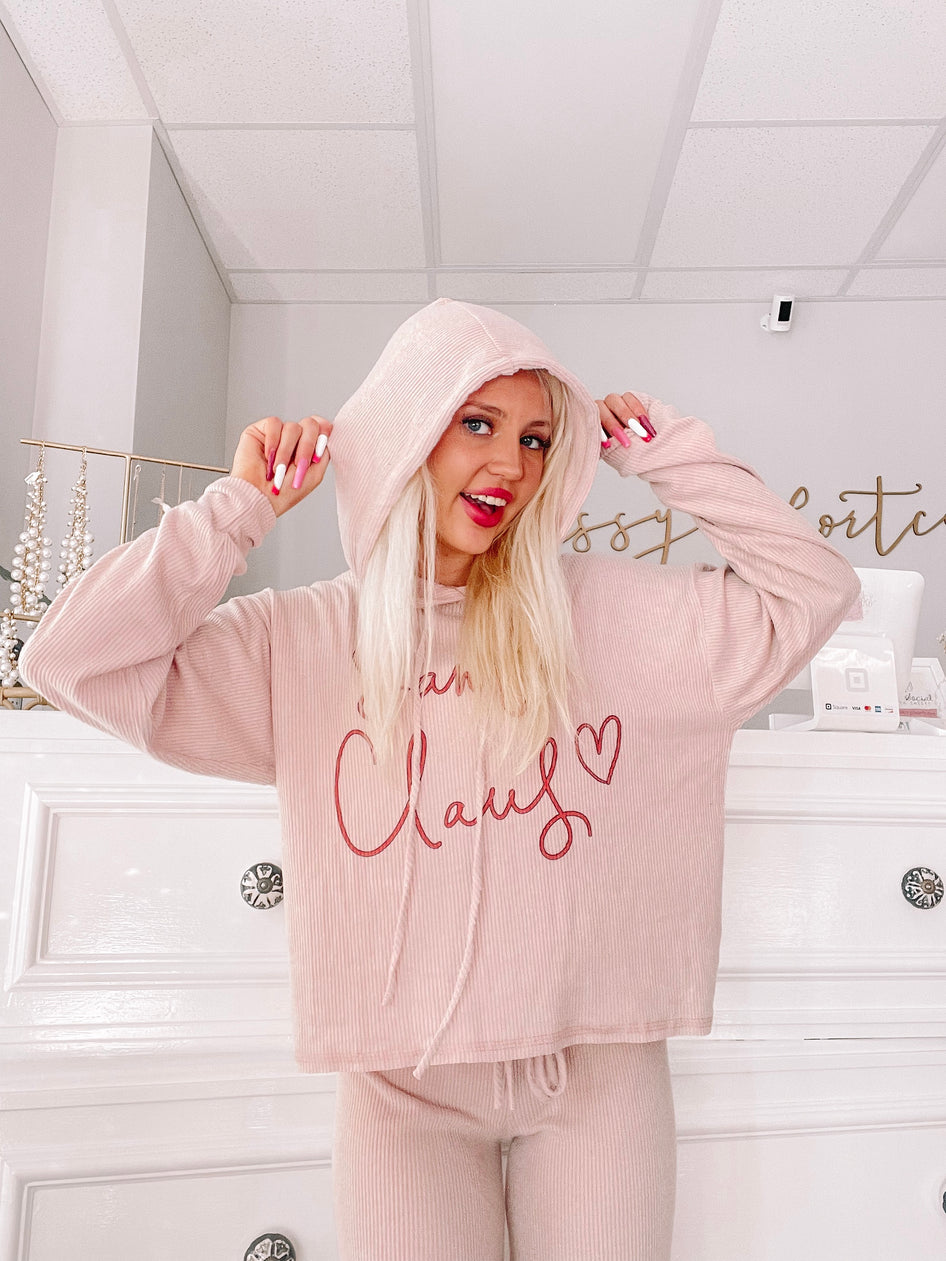 Pink ribbed knit Christmas pajama set with "Mrs. Claus" graphic.
