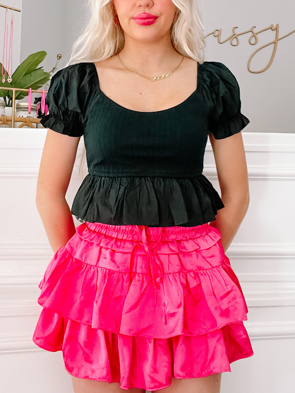 Black Power Puff Top:  Sweetheart neckline, puff sleeves, ruffled hem.
