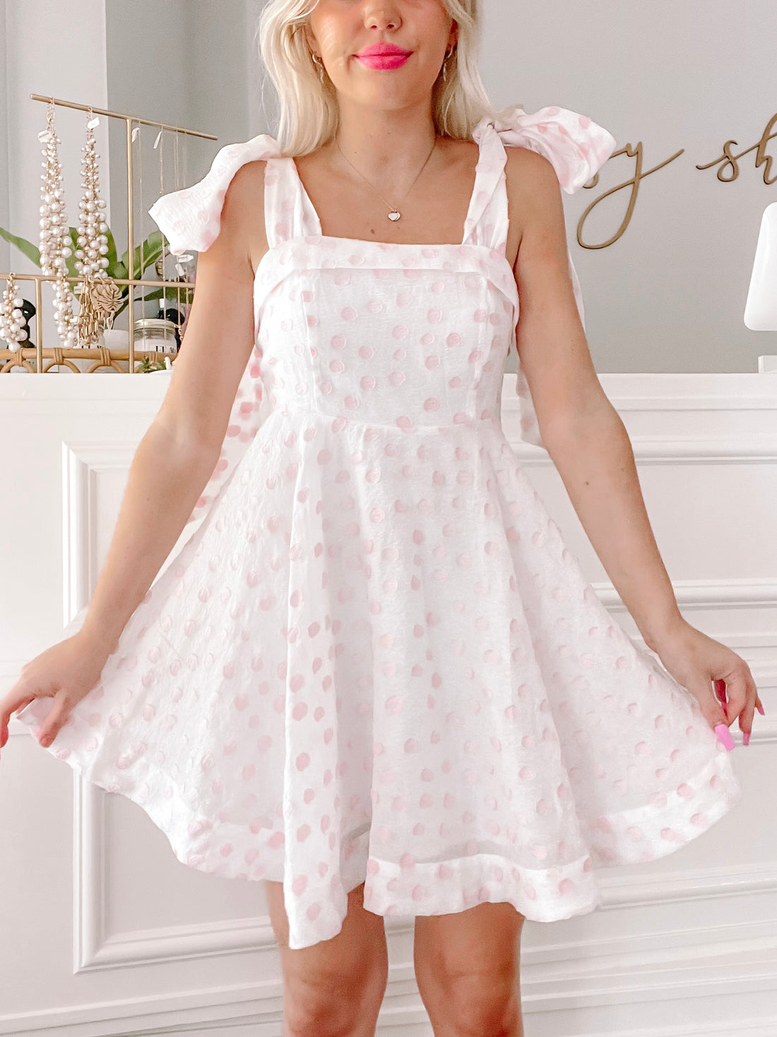 Girls Who Twirl pink polka dot dress with bow shoulder straps
