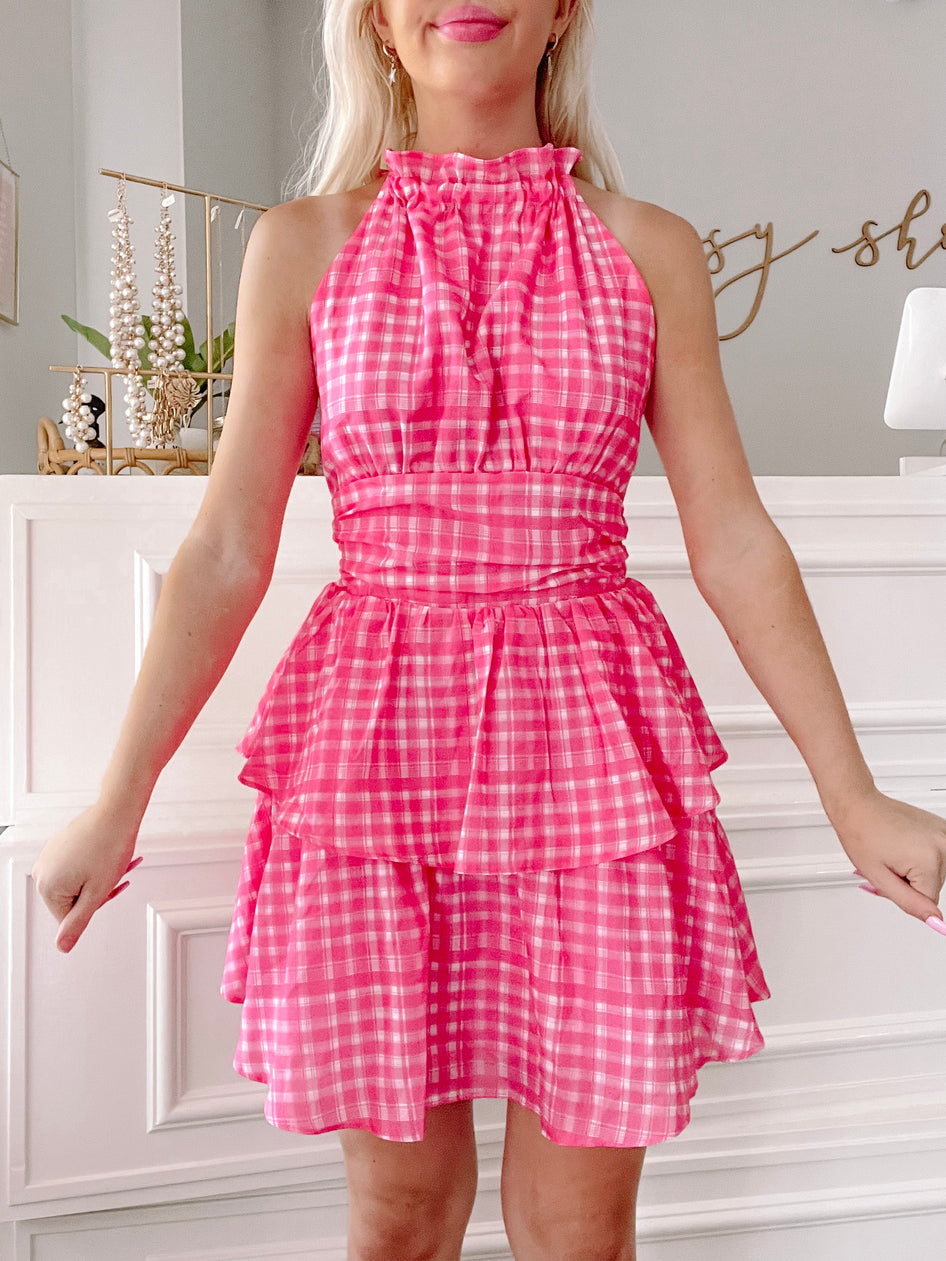 Pink gingham Razzle Dazzle halter mini dress with tiered ruffle skirt
