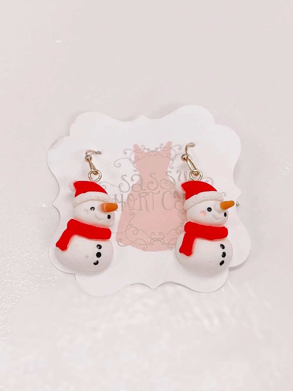 Adorable snowman dangle earrings; red hat & scarf, gold hooks.
