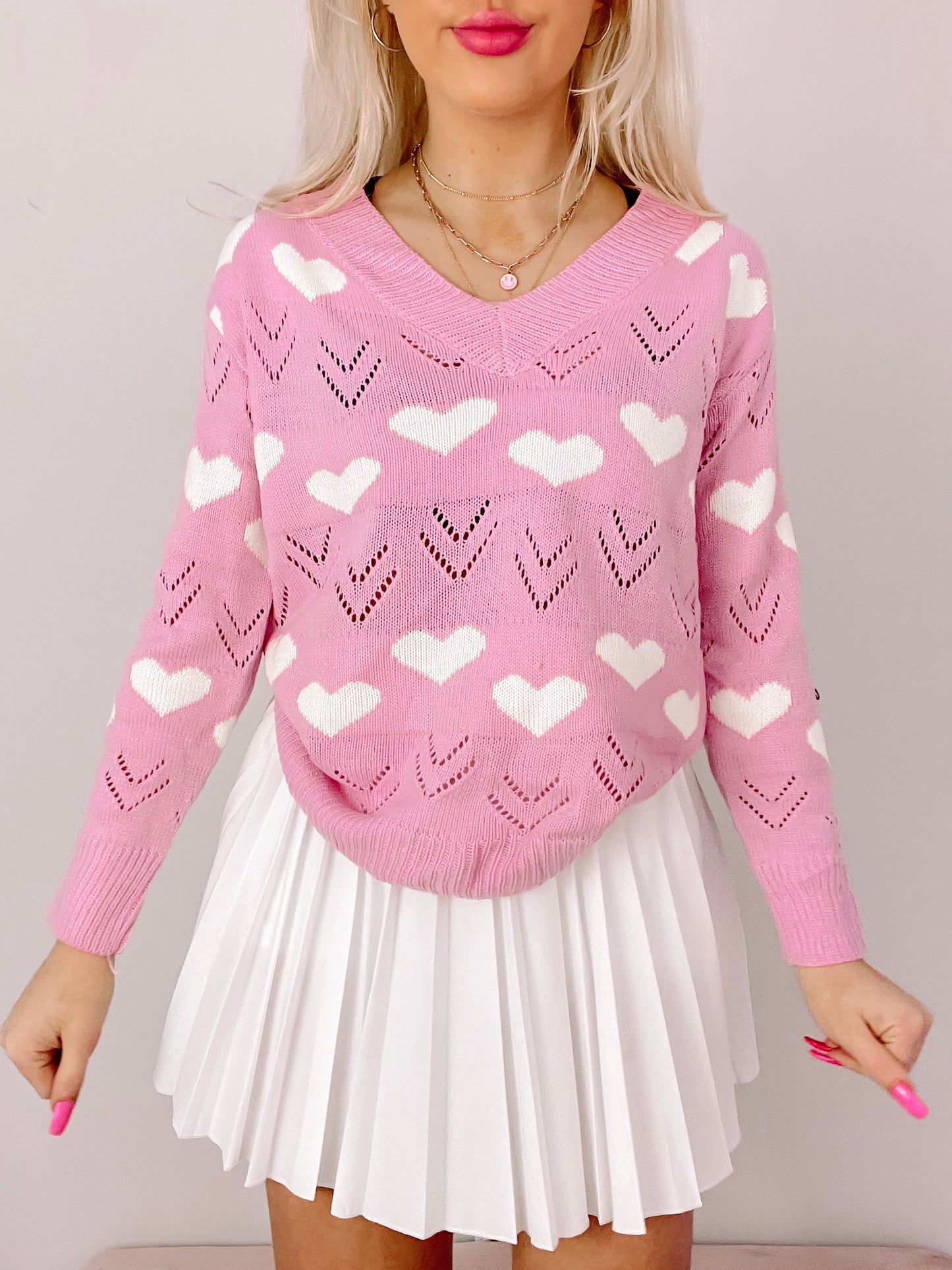 Pink Crushing on You sweater with white heart accents;  cute, lightweight knit.
