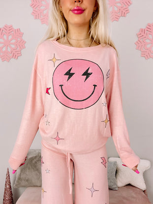 Pink Electric Dreams PJ set with a fun smiley face design.
