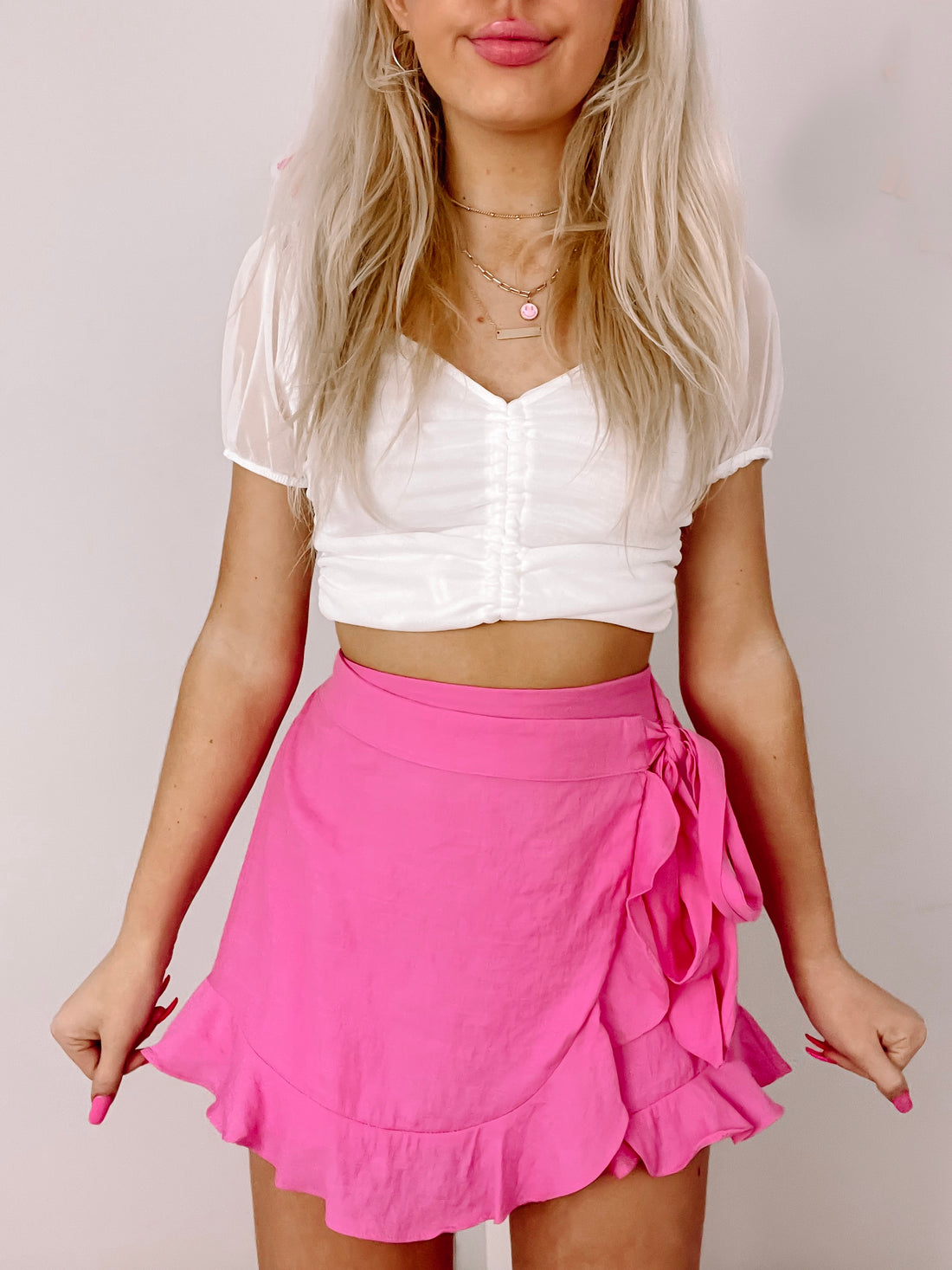 Pink Skips a Beat ruffle wrap mini skirt
