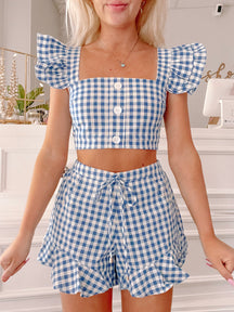 Bluebell blue gingham crop top and shorts set with ruffle details.
