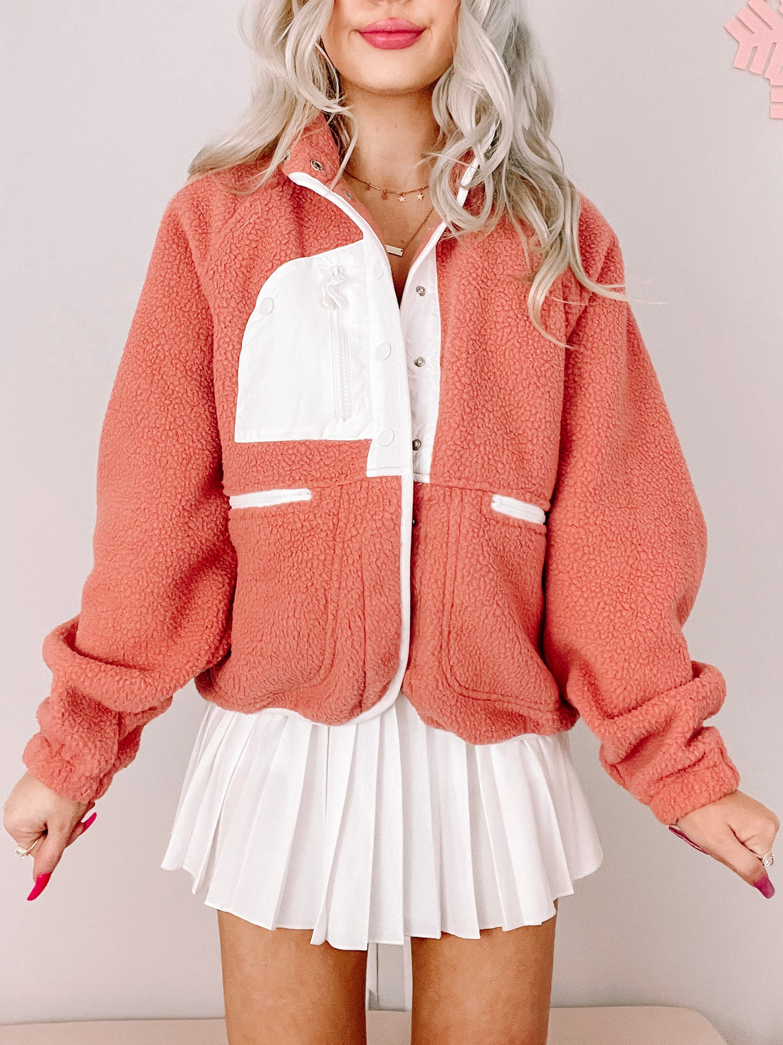 Mauve pink Heartbreaker Jacket: soft, plush fleece, zip & button front, perfect for fall.
