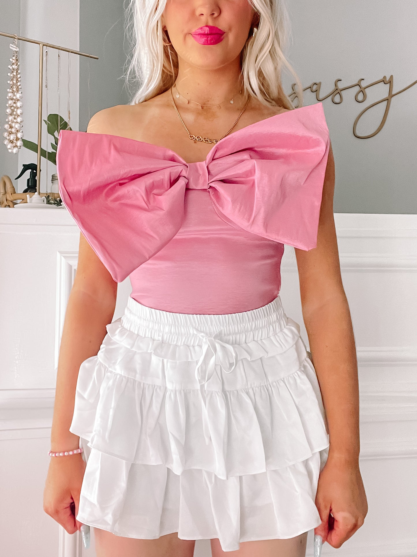 Pink Bow Wow Top; oversized bow detail, off-the-shoulder style
