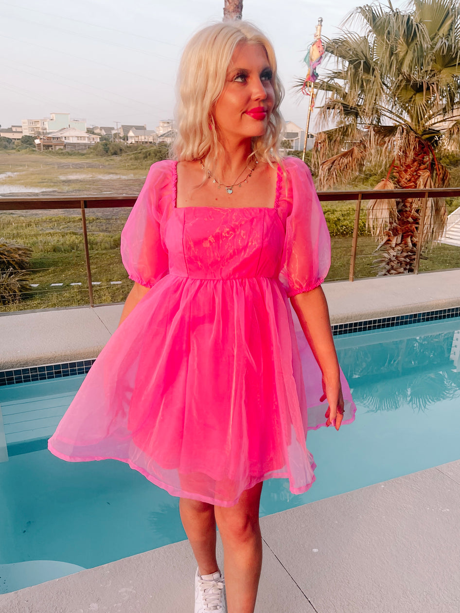 Hot pink Princess Peach-inspired mini dress; sheer organza fabric, puff sleeves.
