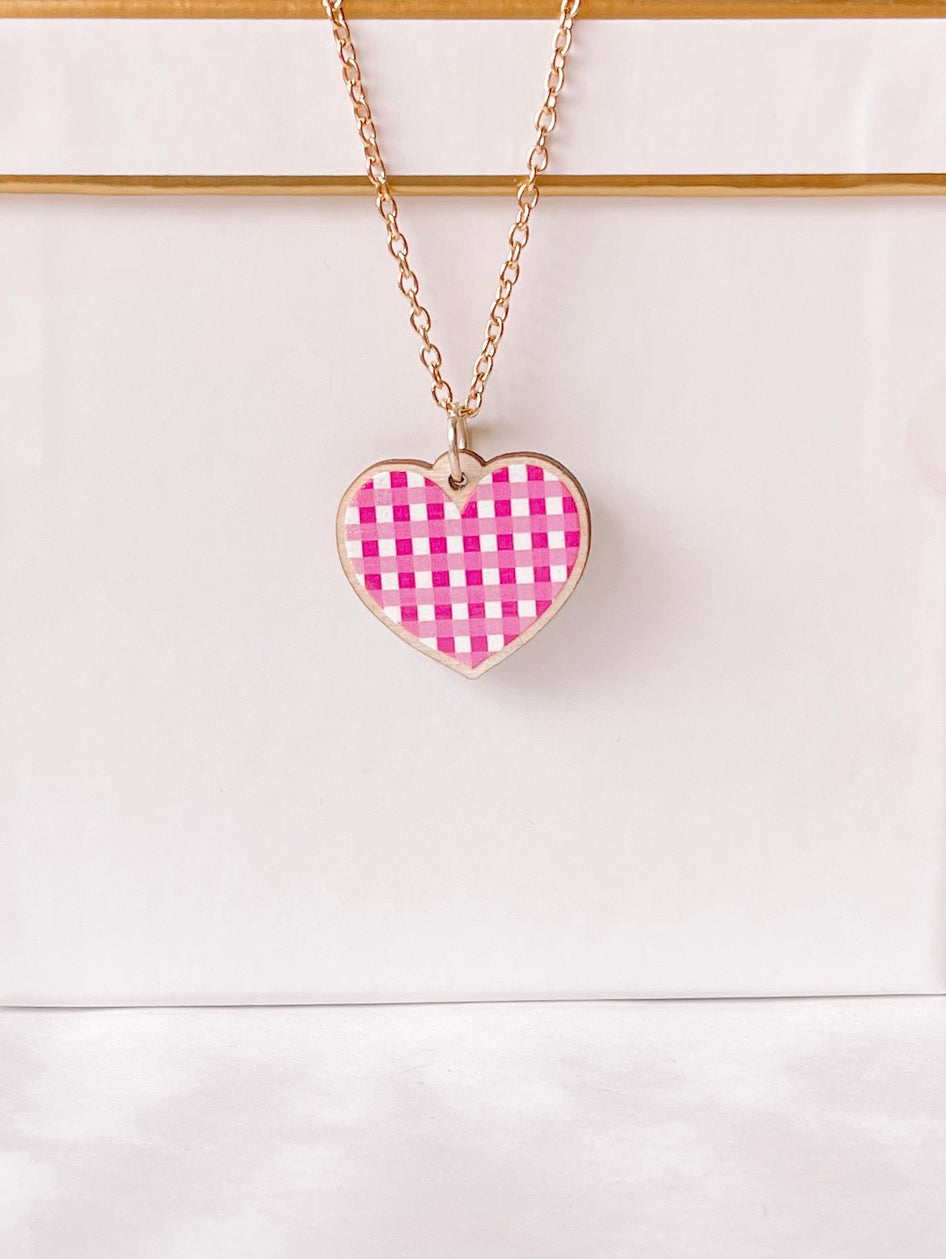 Pink gingham heart necklace with gold chain
