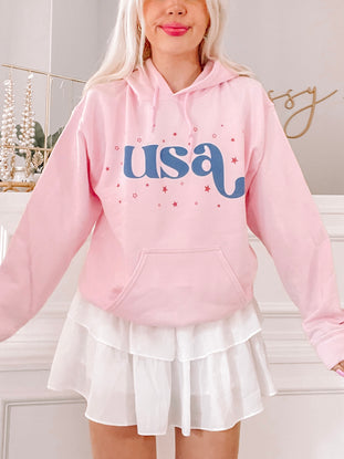 Pink USA Sparkle Hoodie:  Cute pink hoodie featuring "USA" graphic & stars. Perfect for showing your patriotic style!
