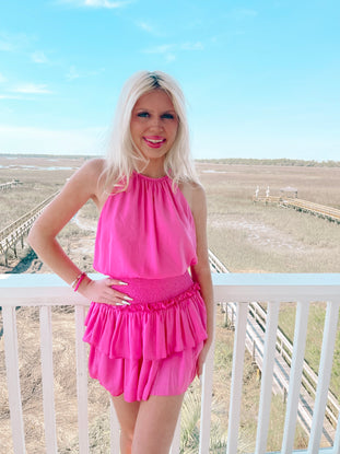 Positively Pink halter neck mini dress with smocked waist and tiered ruffle skirt
