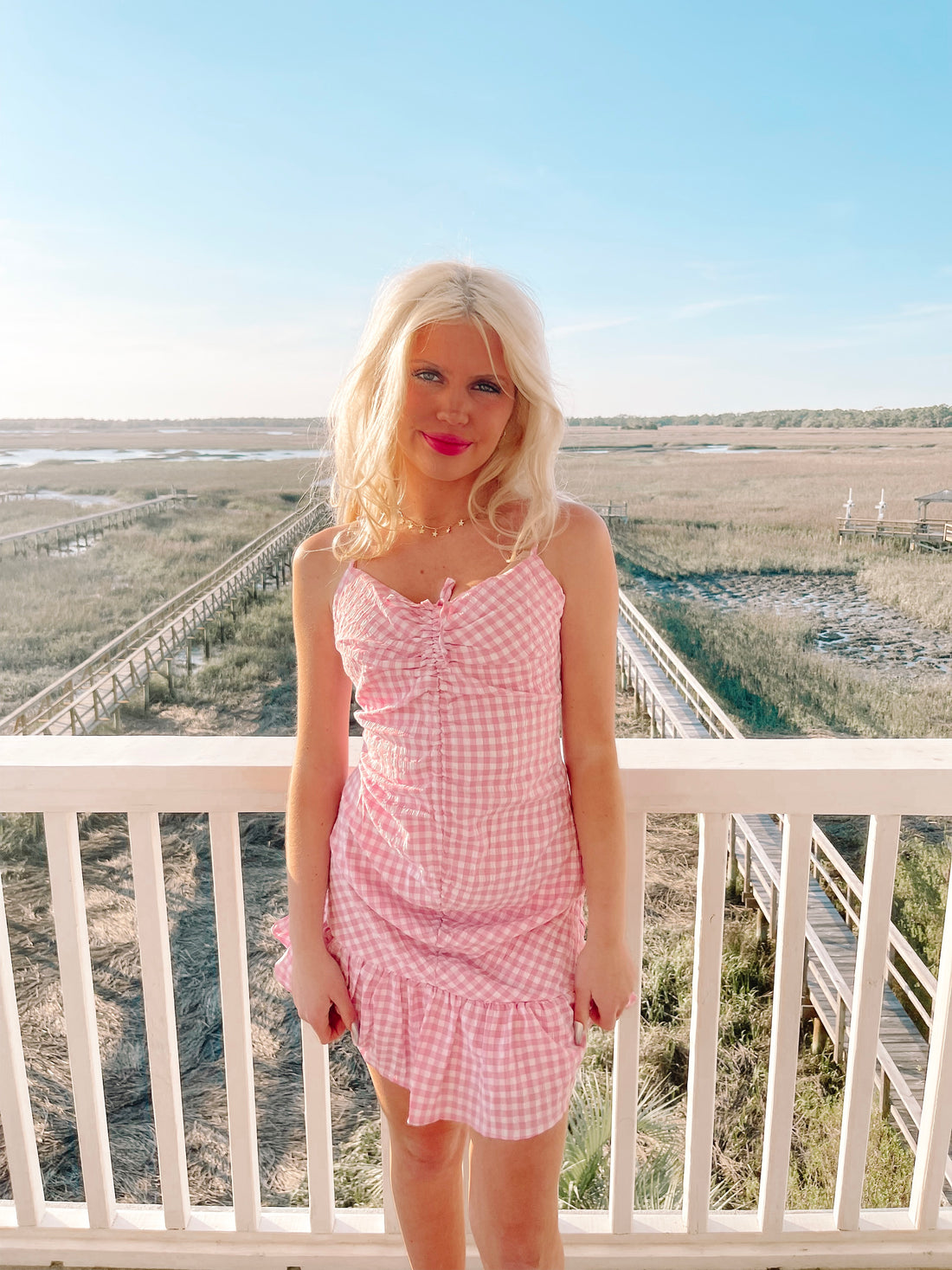 Pink gingham Sweet Talker dress with ruffle hem
