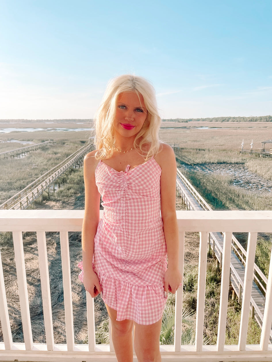 Pink gingham Sweet Talker dress with ruffle hem

