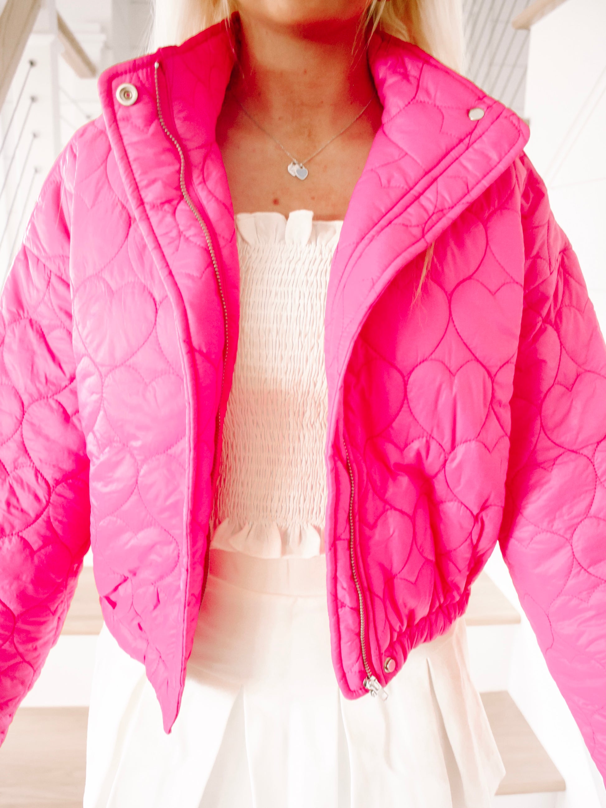 Hot pink heart-quilted puffer jacket, cropped style

