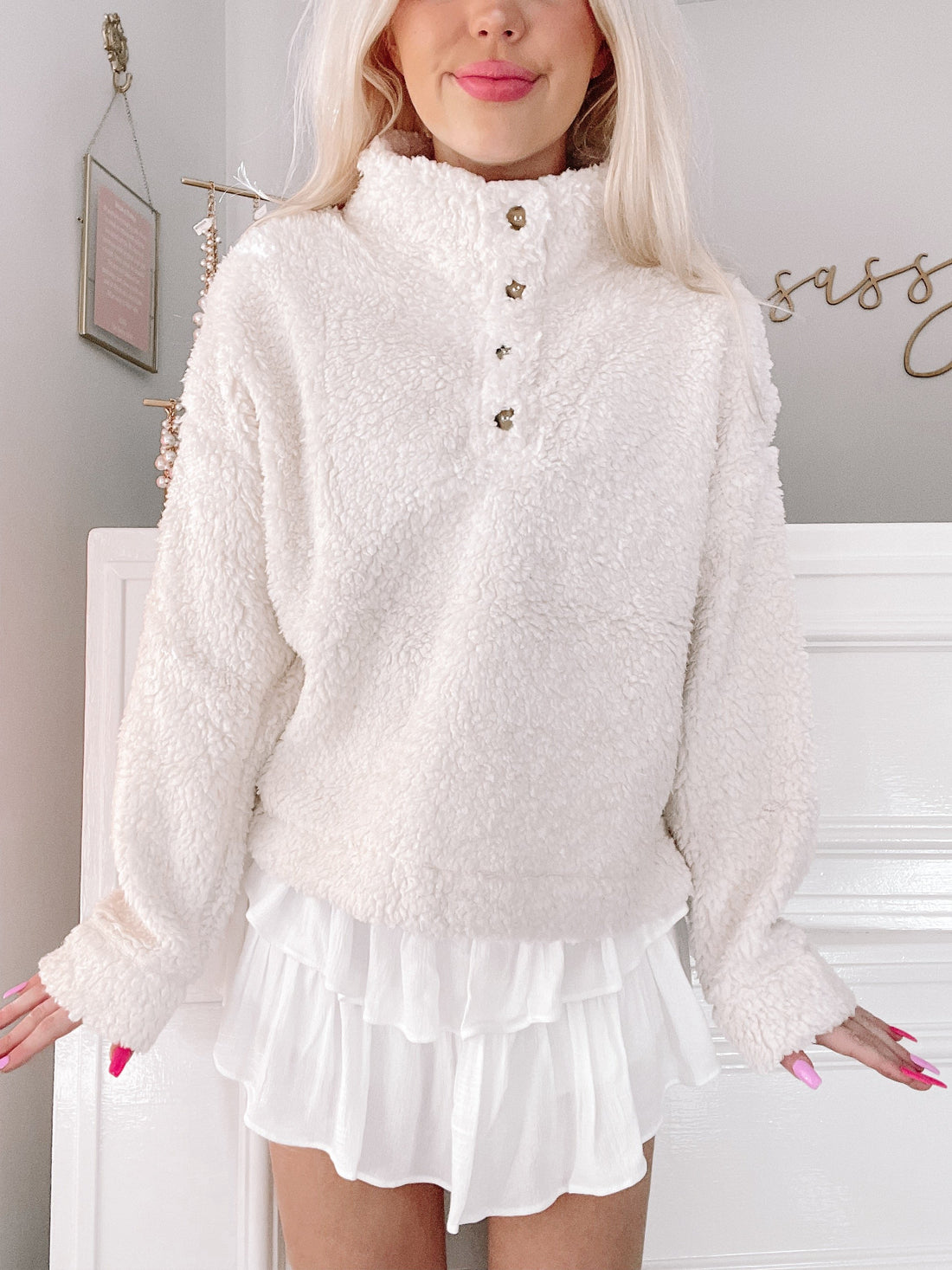Cream Campfire Cozy Sherpa Top: Soft, fluffy sherpa pullover with button detail.
