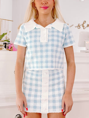 Deb Tea Gingham Set: Light blue and white gingham crop top and skirt set with white collar and buttons.
