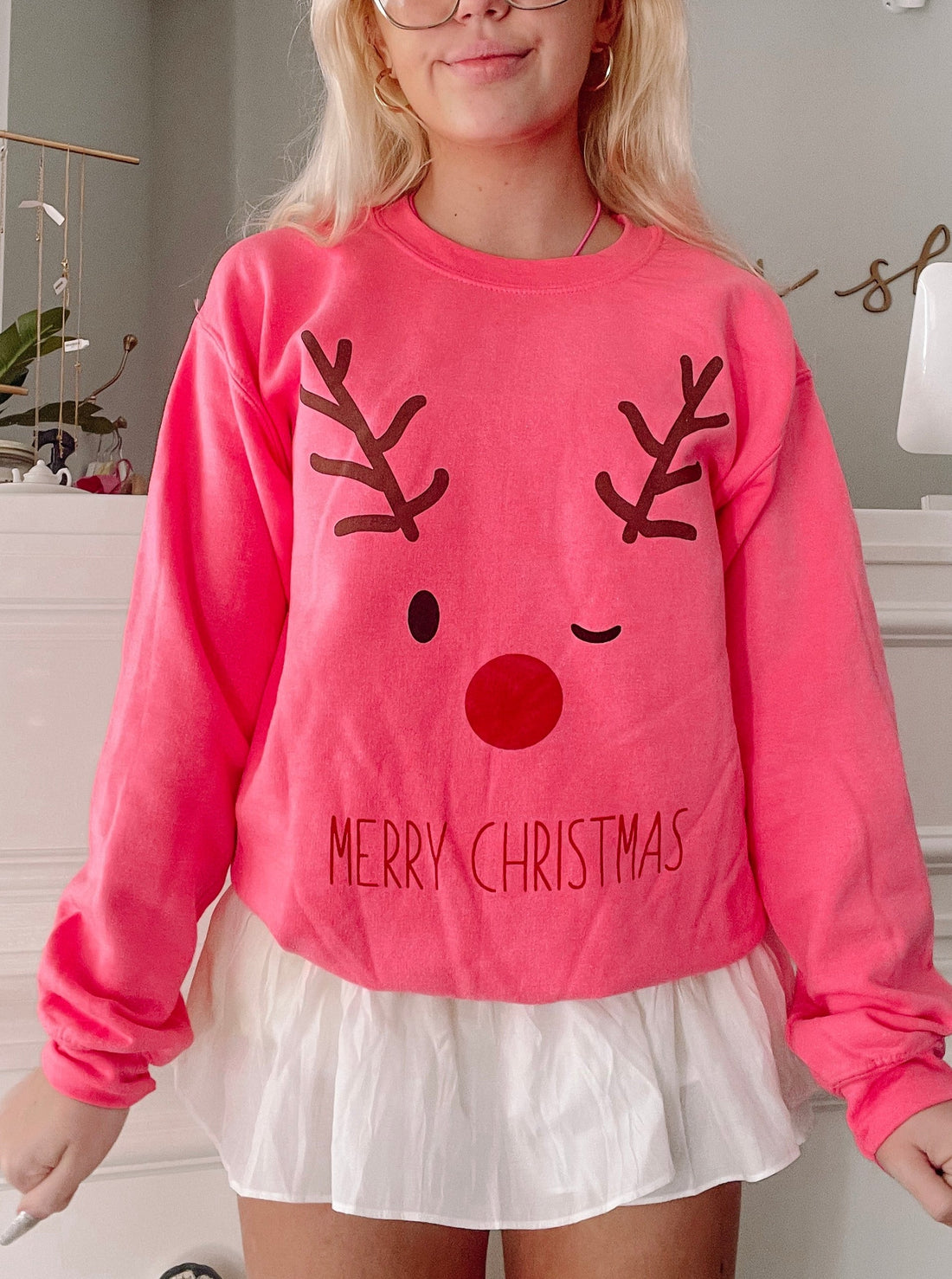 Pink Rudolph crewneck sweatshirt with "Merry Christmas" text

