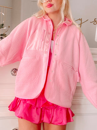 Bubblegum pink Heartbreaker Jacket: soft fleece, oversized fit.
