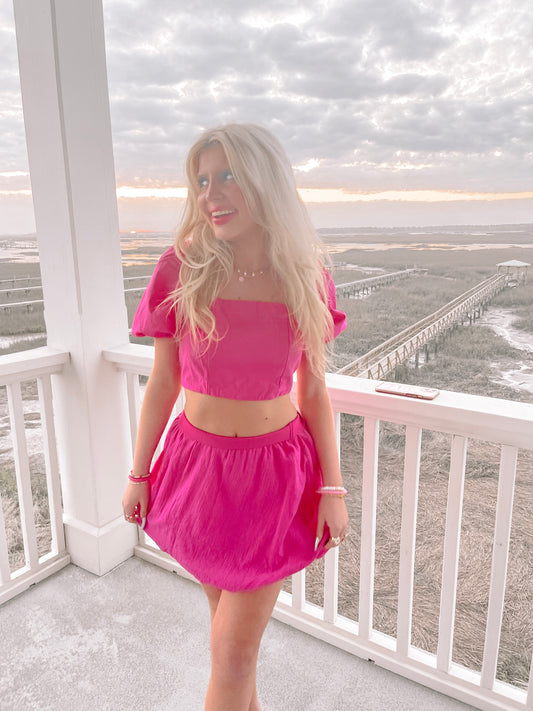 Bubble Babe Skirt: Hot pink mini skirt, perfect for a summer night out.
