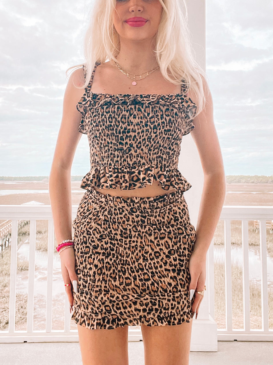 Feline Fine Leopard Print Mini Skirt; brown & black smocked fabric.
