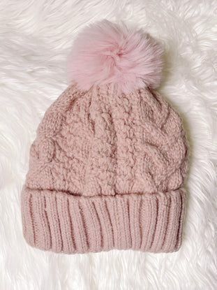 Pink cable knit Buffy beanie with fluffy pompom
