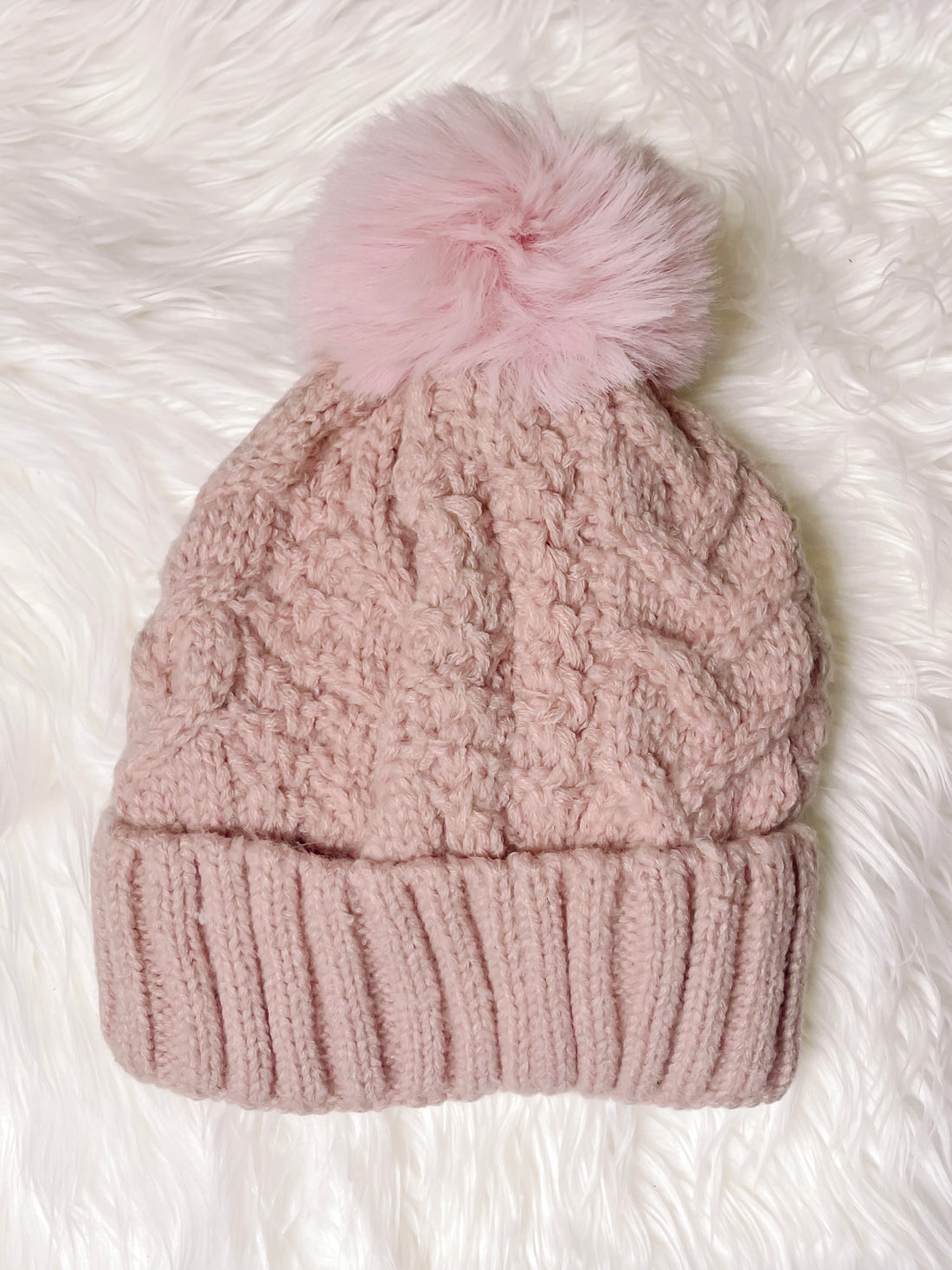 Pink cable knit Buffy beanie with fluffy pompom
