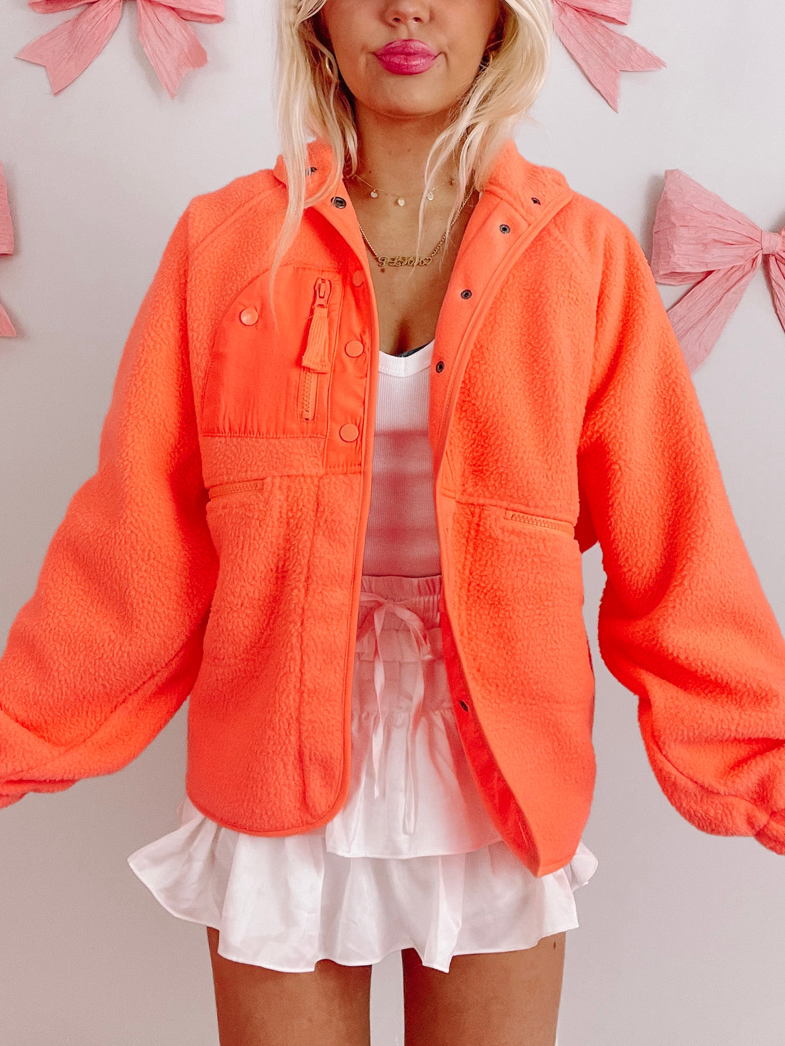 Tangerine Heartbreaker Jacket: bright orange fleece jacket with snap and zip closure
