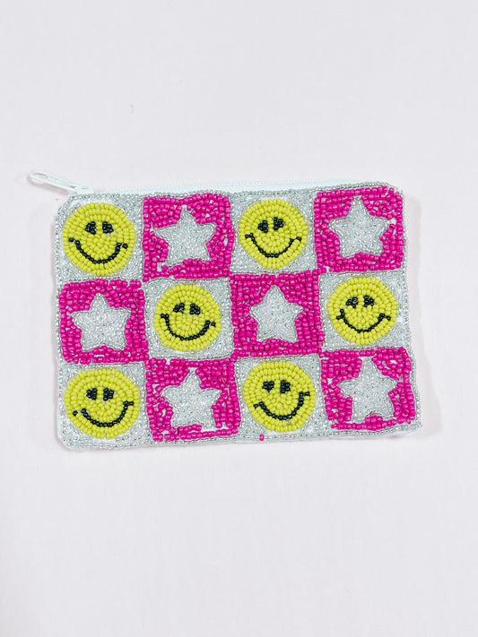 Beaded zipper pouch with pink and silver stars and smiley faces.