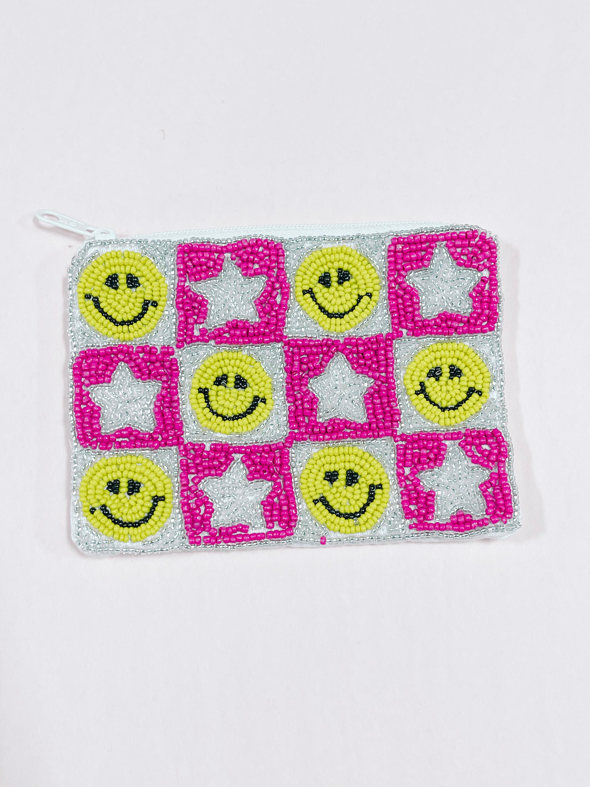 Beaded zipper pouch with pink and silver stars and smiley faces.
