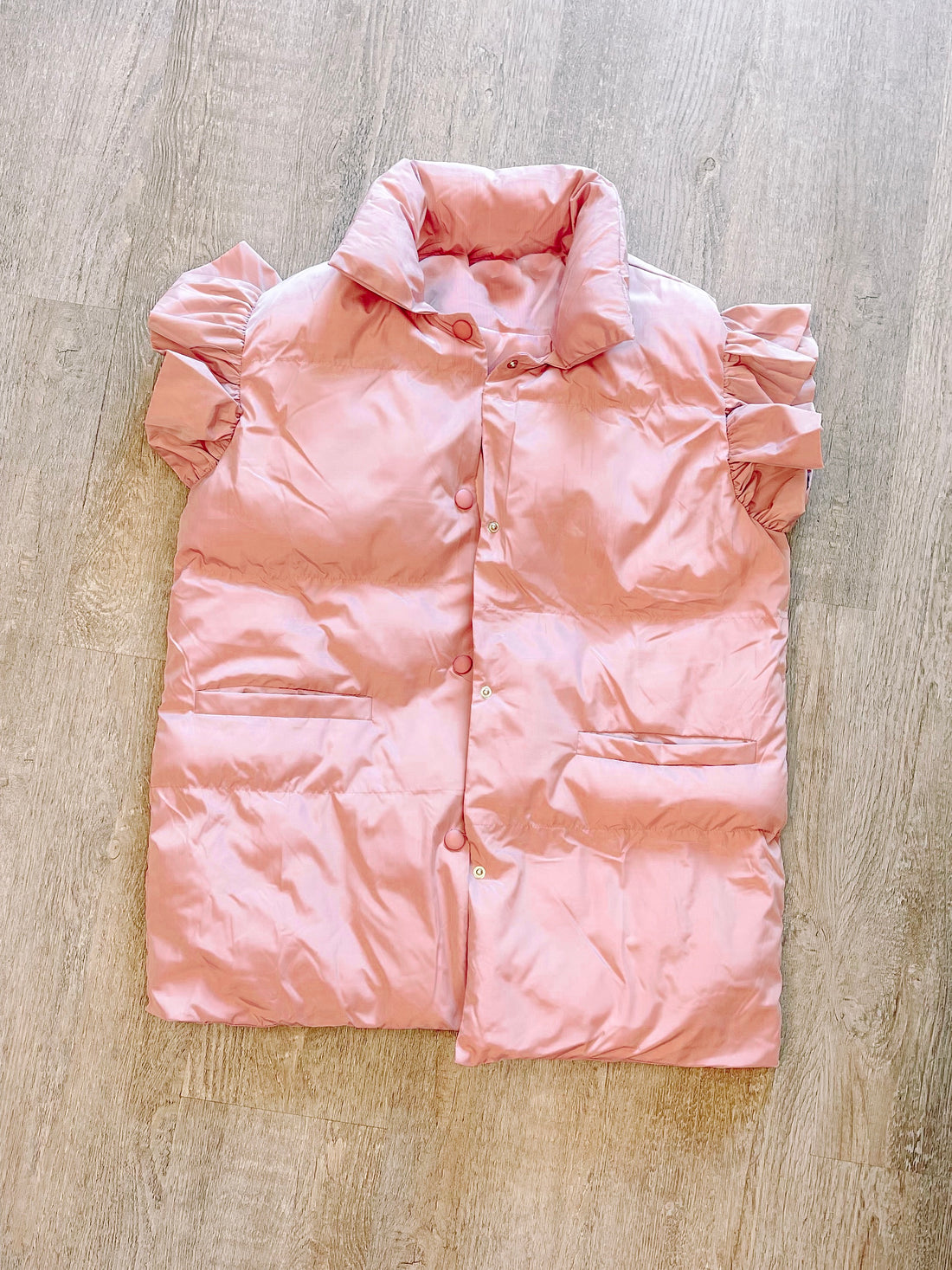 Pink Uptown Puffer Vest with ruffle sleeves
